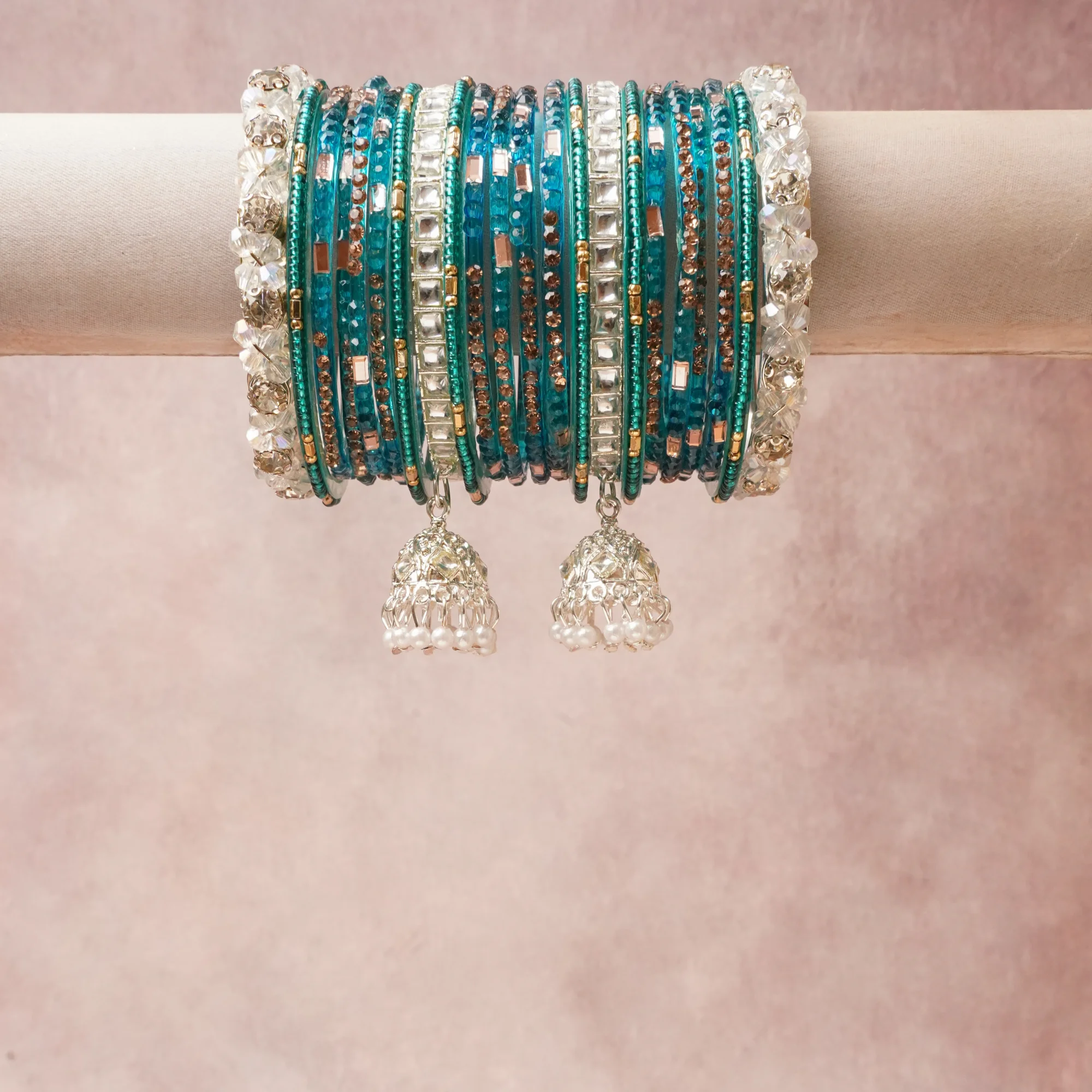 A commanding Deep Teal anchors this beautiful set, enriched with accents of Clear Crystal, Antique Gold, Polished Silver, Rose Gold, Pearl White that add depth and dimension.

Featuring a striking composition of Glass, Metal Alloy, Crystals/Rhinestones, Faux Pearls, Seed Beads, this set carries intricate craftsmanship and strong presence. Grand in form, it is created for moments that deserve to be marked.